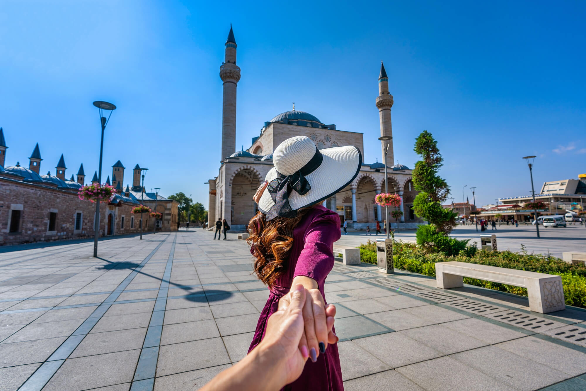 women-tourists-holding-man-s-hand-leading-him-mosque-konya-turkey